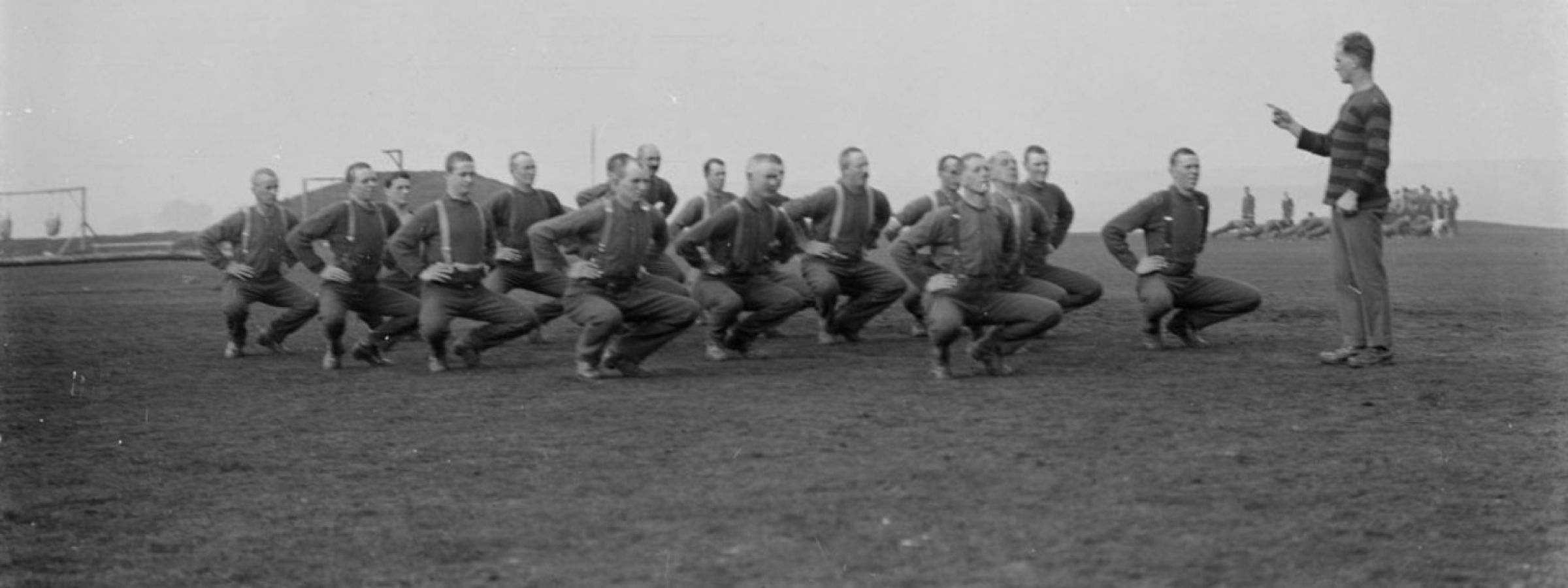 New Zealand soldiers from the Canterbury Battalion exercising under direction from their instructor. Sling Camp, Bulford, England.